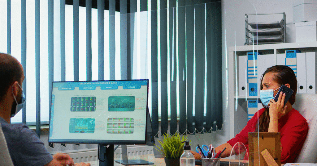 a woman at a clinic looking at metrics