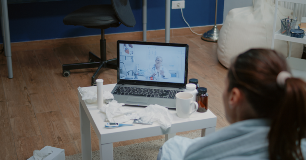 Clinic staff using telemedicine platform dashboard for appointment scheduling and management